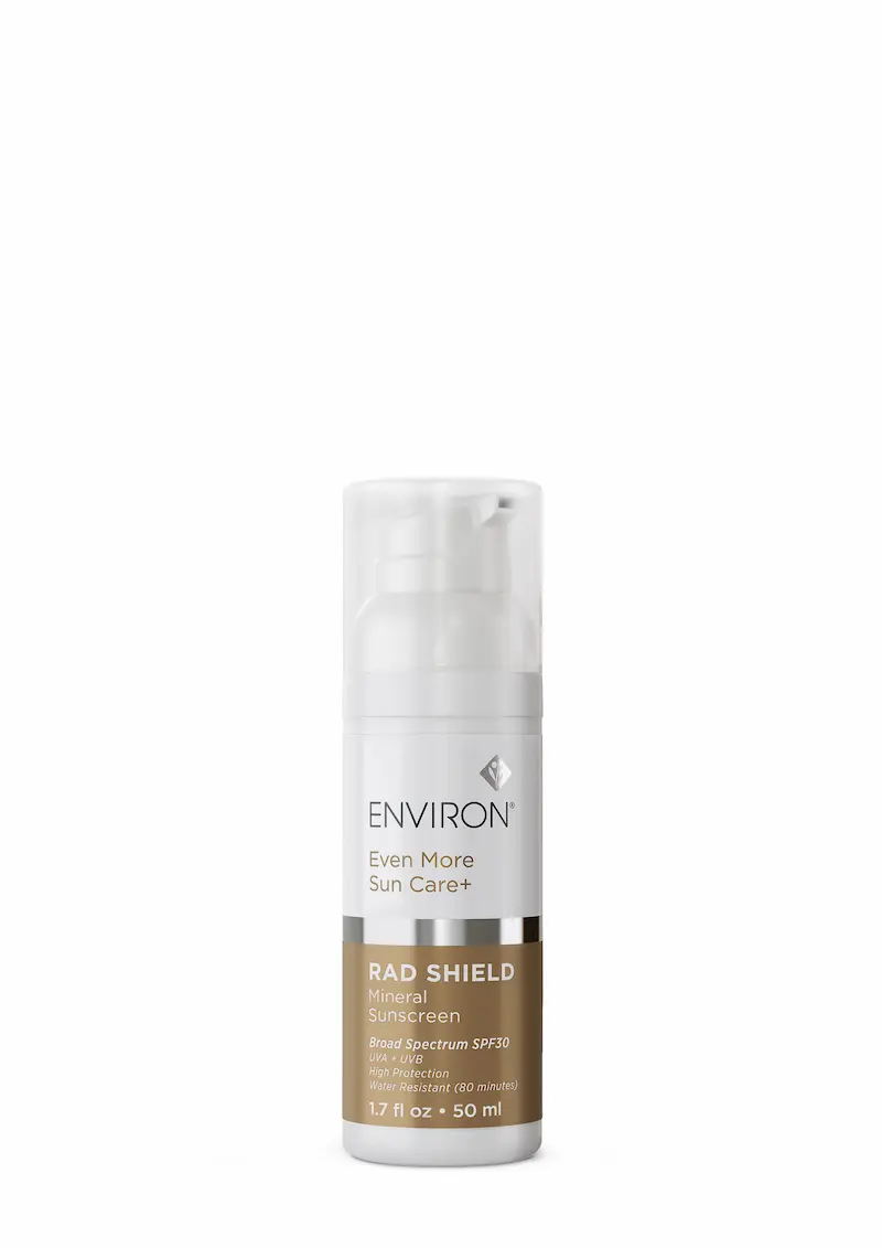 Environ broad spectrum SPF sunscreen for hyperpigmentation prevention and skin protection on white marble surface